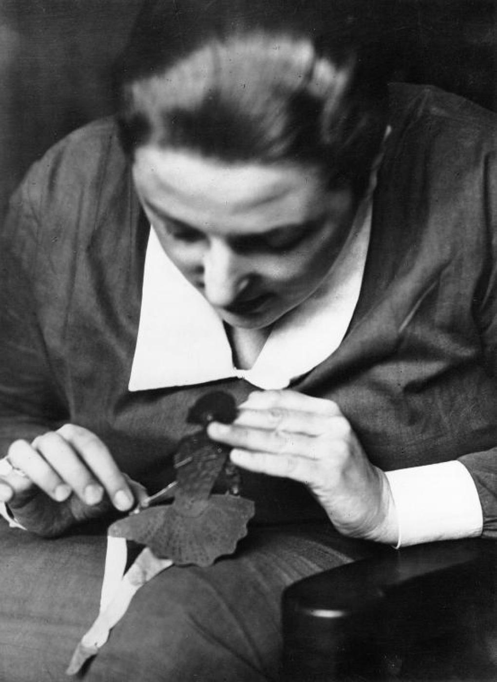 Lotte Reiniger at work on a silhouette cut-out (Women Film Pioneers: Lotte Reiniger).